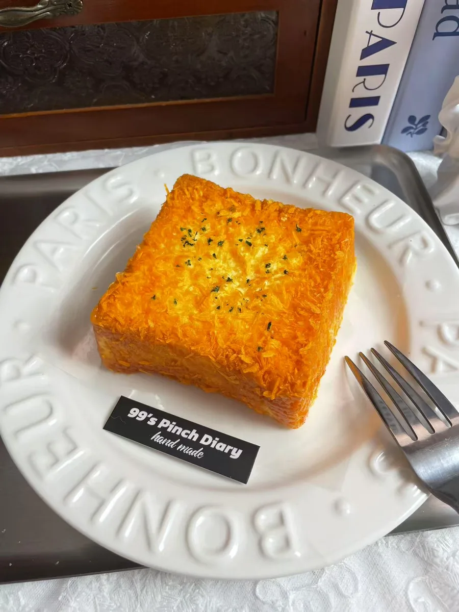 Pork Floss Toast Slice Squishy Toy - image 1