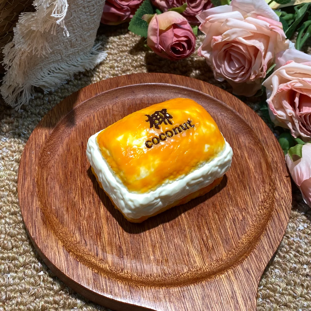 Triple Thick Coconut Bun Squishy Toy - image 1