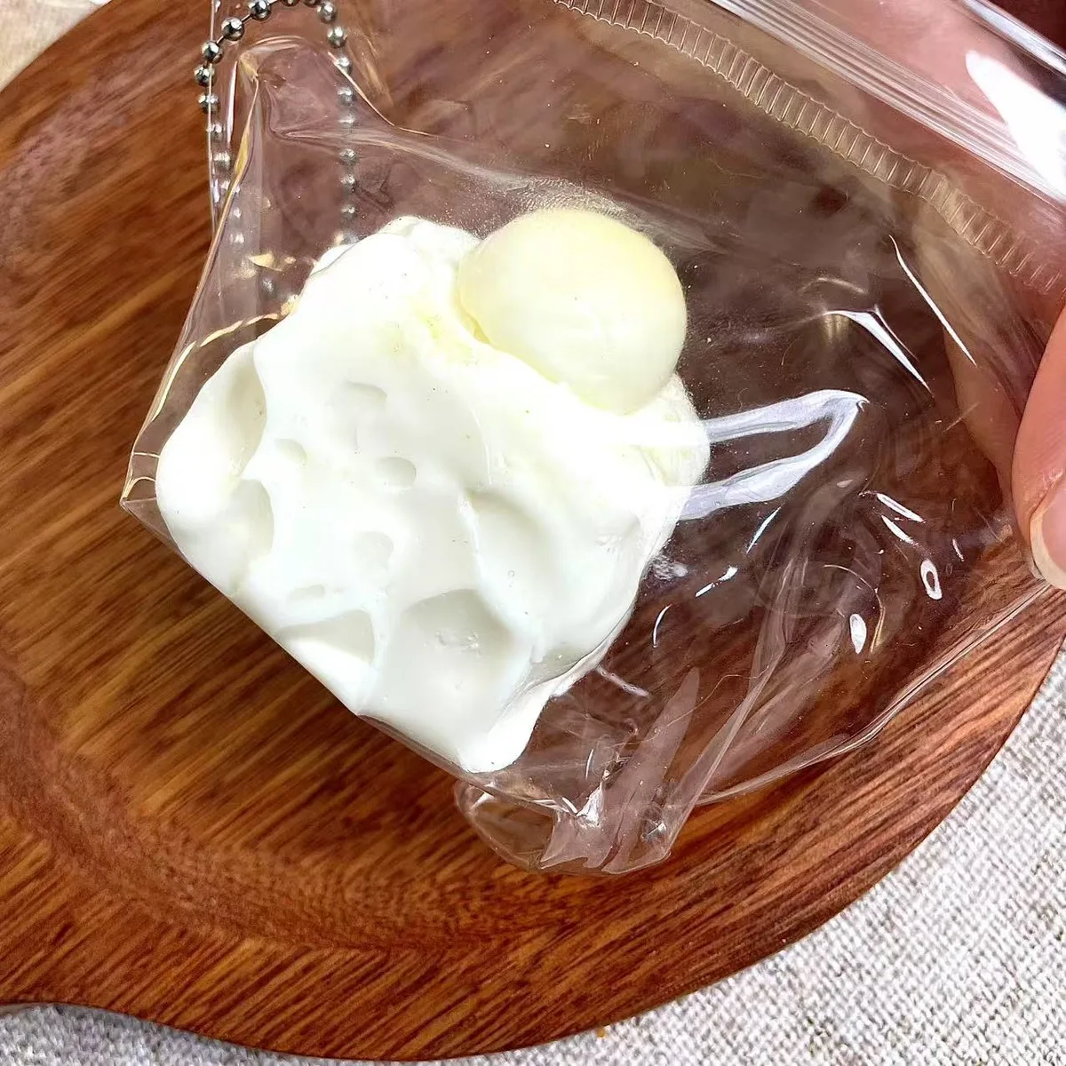 Soy Milk Yogurt Cube Charm Squishy - image 1