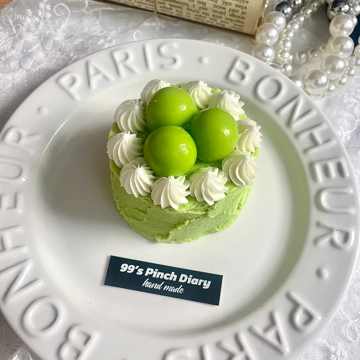 Green Grape Frosted Cake Squishy Toy - image 1