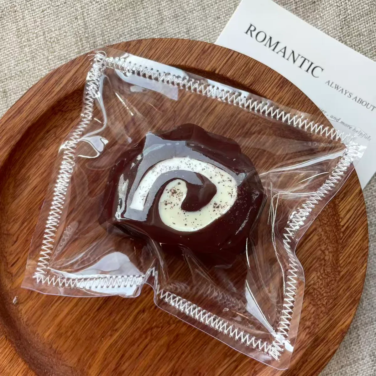 Chocolate Swiss Roll Squishy Toy - image 1