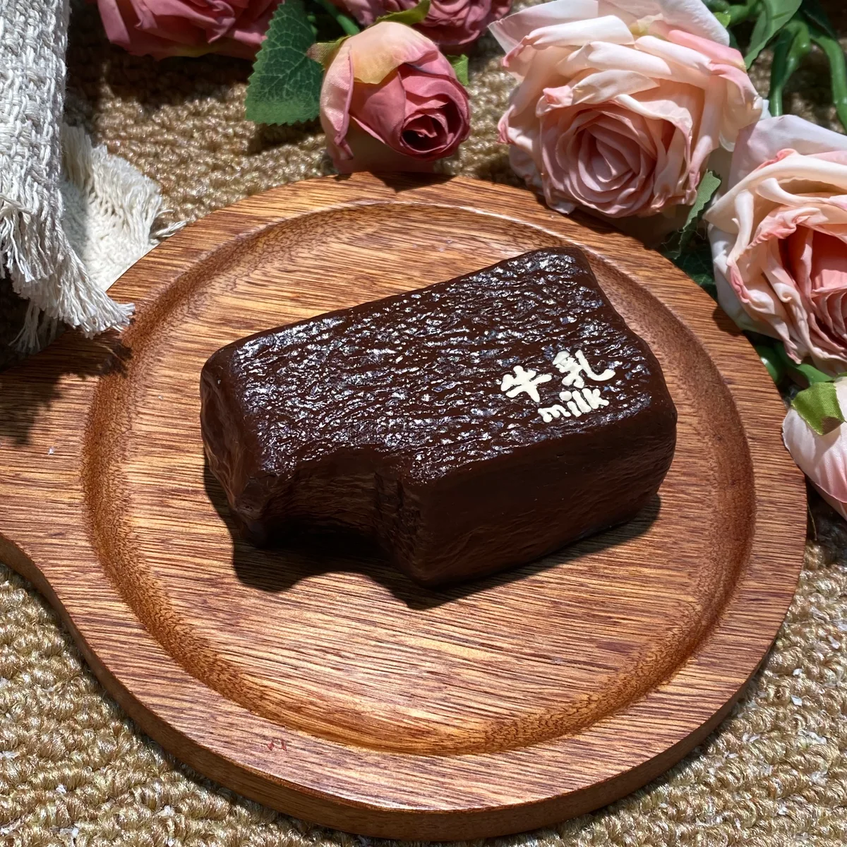 One-Bite Dark Chocolate Milk Cake Squishy Toy - image 1