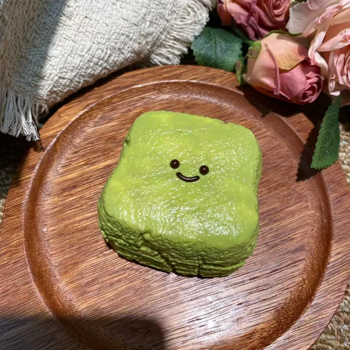 Matcha Smiley Bread Squishy Toy - image 1